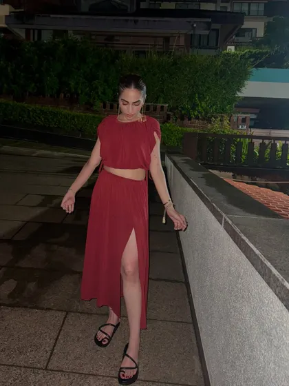 Another angle of the red co-ord set, perfect for vacation outfit inspiration.