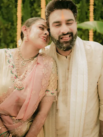 A playful and intimate moment between the couple during their Haldi ceremony.