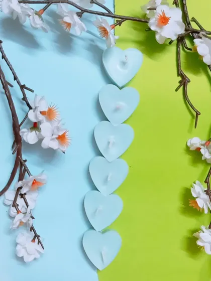 Dive into tranquility with these calming, light blue heart-shaped candles. These are scented with my 'Evening Breeze' fragrance and made with pure soy wax.