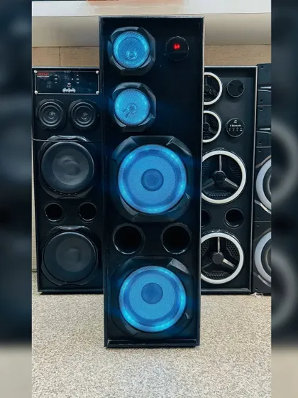 Another view of the Black Star tower speaker with its signature blue lights. The solid build and high-quality components ensure you get the best sound for your money.