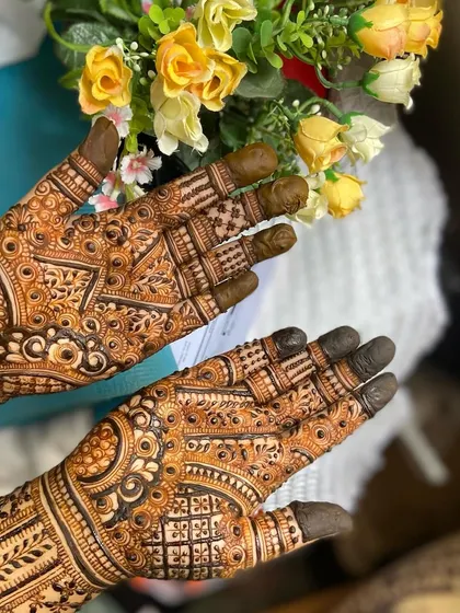 This is a detailed view of my intricate bridal henna work. Each design is unique, combining traditional patterns like paisleys and mandalas with fine-line fillers to create a stunning, full-coverage look for your special day.