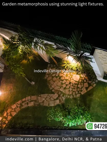 A duplicate aerial shot of the garden at night, emphasizing the beauty of the illuminated landscape design.