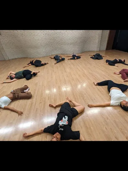 A moment of release and relaxation. Our beginner classes always include a proper cool-down to help the body recover and integrate the day's learnings.