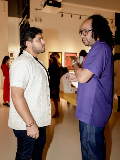 In conversation at the Andy Warhol exhibition pre-opening. Part of my service is consulting and connecting with event organizers to ensure the music perfectly aligns with their vision.