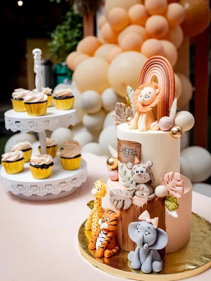 A close-up of the incredible animal-themed cake from a first birthday party. I always make sure to capture the beautiful details you've planned.
