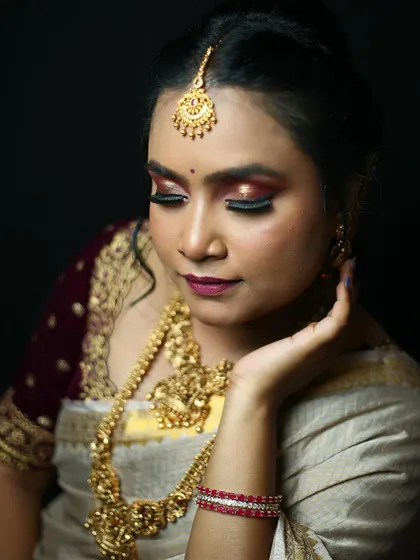 A close-up on the vibrant eye makeup from this creative shoot. I love playing with rich, metallic colors to create a dramatic and memorable look.