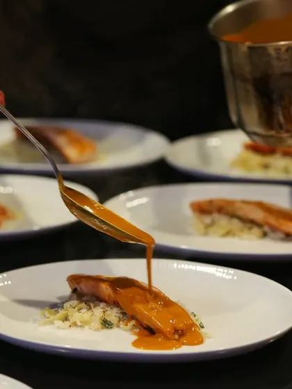 My modern interpretation of a South Indian classic. This Chicken 65 Roulade is made by sous-viding the chicken breast, serving it over a refreshing cabbage poriyal, and finishing with a flavorful sauce.