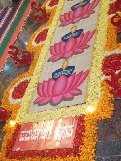 An identical image of the lotus and lamp themed floral runner, a perfect decorative element for auspicious beginnings.