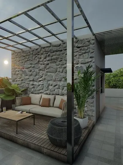 This 3D render shows a proposed terrace lounge design for a client in Shimoga. I used a stone accent wall and a pergola to create a cozy and stylish outdoor seating area.