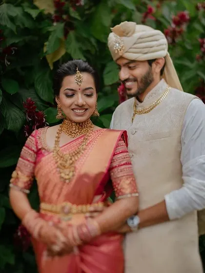 A gentle moment of affection against a backdrop of lush greenery. We love creating these serene and intimate couple portraits that you will cherish for a lifetime.