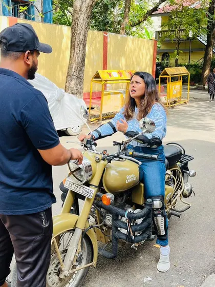 A student asking questions during a lesson. I encourage open dialogue to ensure every rider feels completely comfortable and understands each step of the process.
