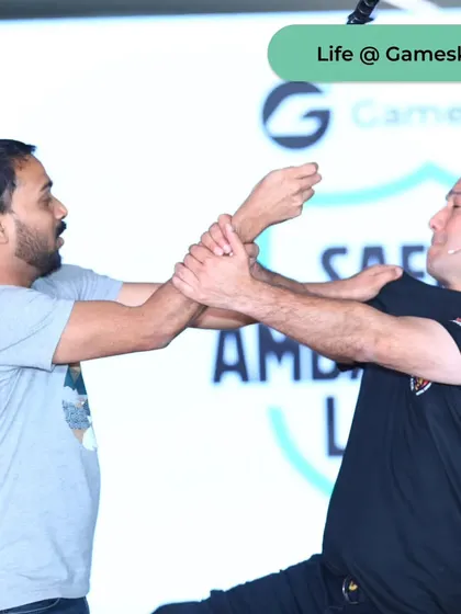 Here, I demonstrate a simple but effective wrist-lock technique to a Gameskraft employee. My methods are designed to be learned quickly and applied instinctively, regardless of a person's size or strength.