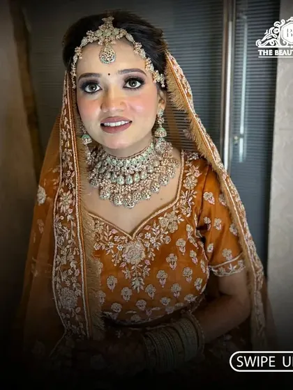 A closer look at this bride's joyful expression. The makeup is soft and glowing, with an emphasis on flawless skin and bright eyes.