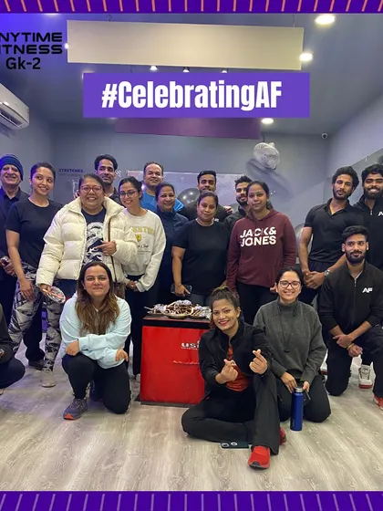 The whole crew celebrating 50 branches of Anytime Fitness in Delhi.
