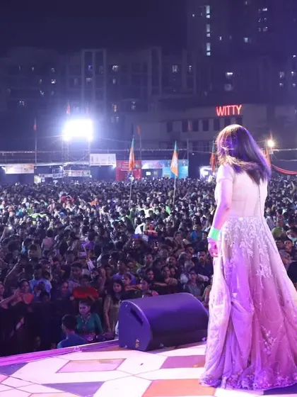 Facing a sea of fans at our outdoor Navratri concert. Performing at this scale is always an exhilarating experience.