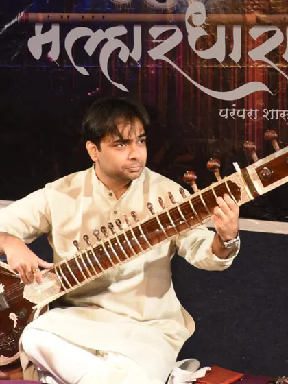 A close-up of my performance at Malhardhara. The intensity and emotion of playing a traditional raag are captured in this shot.