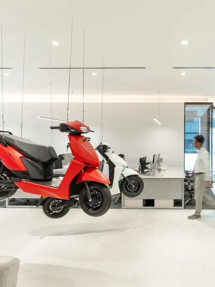For an electric vehicle company's head office, we suspended two of their signature scooters from the ceiling. This bold installation serves as a constant source of inspiration and a tangible reminder of the company's purpose and innovation.