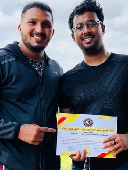 Awarding a certificate at our Muay Thai training camp. I believe in recognizing the dedication and progress of every student.