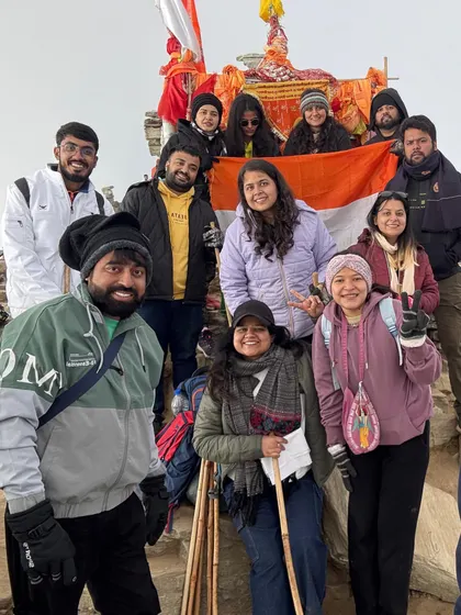 Our travel tribe at the top of Chandrashila, proudly holding the Indian flag. This trek is a mix of adventure and patriotism, offering panoramic views that make the climb worth it.