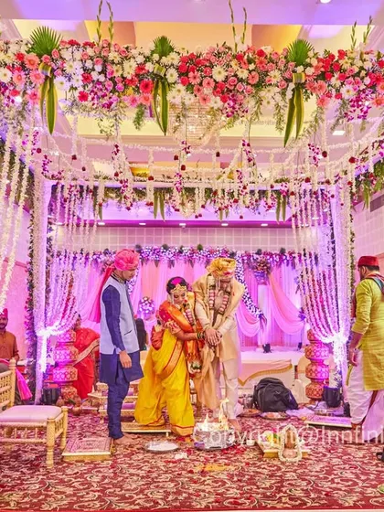I always take wide shots to capture the scale and beauty of your wedding decor. This photo shows the entire mandap, giving a sense of the grand setting.