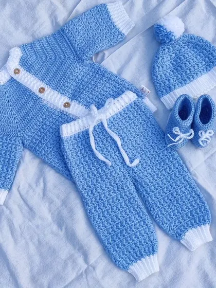 The complete newborn winter set in blue and white, a perfect baby shower gift.