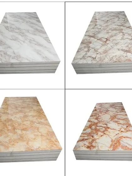 A collection of four different PVC marble sheet designs, showcasing the variety of colors and vein patterns available, from beige to reddish tones.