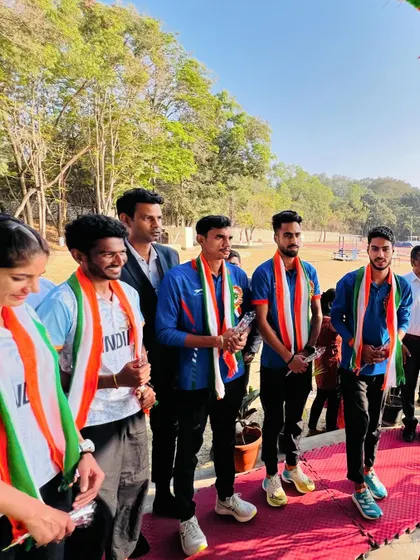 A group of honored athletes at the Republic Day ceremony, their faces reflecting pride and dedication.