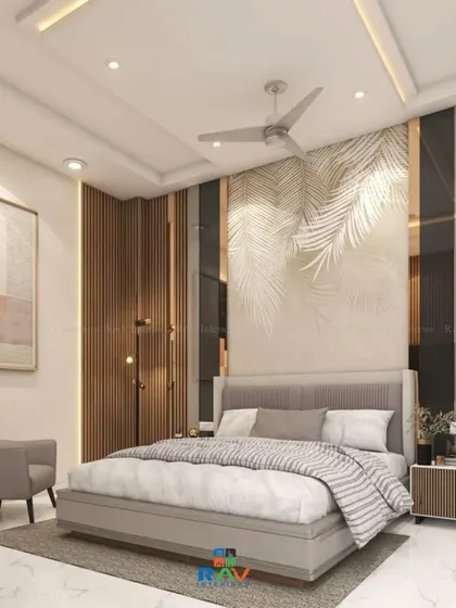 This bedroom design uses a combination of wood fluting and a delicate leaf-patterned wallpaper to create a serene and natural-themed accent wall.
