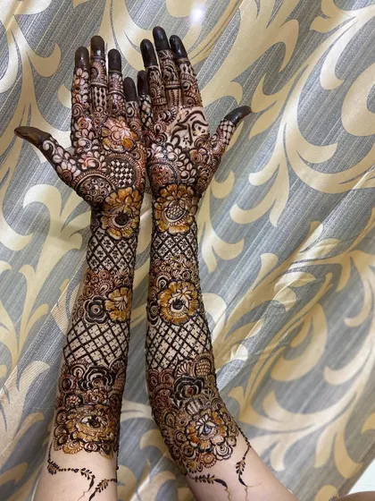 This is a detailed view of my intricate bridal henna work. Each design is unique, combining traditional patterns like paisleys and mandalas with fine-line fillers to create a stunning, full-coverage look for your special day.