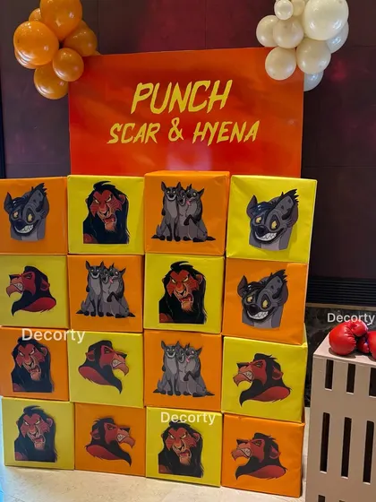 The 'Punch Scar & Hyena' wall game, a creative and engaging activity for a kids' party.