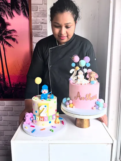 Here I am with the two cakes for two different 2nd birthdays. It gives me great joy to be a part of these celebrations in a small but impactful way.