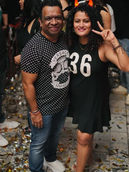 Posing with a friend at our Halloween themed midweek party.