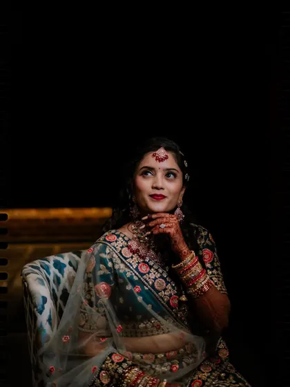 Duplicate of image 305, a pensive bridal portrait.