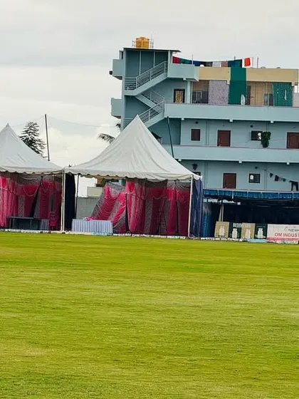 The event tents set up near the main pavilion building, showcasing the integrated facilities at our ground.