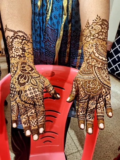 A beautiful example of how different patterns can be combined to create a cohesive and stunning bridal design.