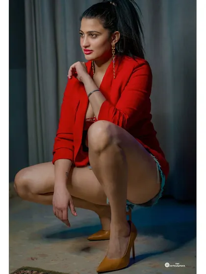A full-body shot from the same series, showcasing a dynamic pose. I guide my clients on posing to get powerful shots like this.