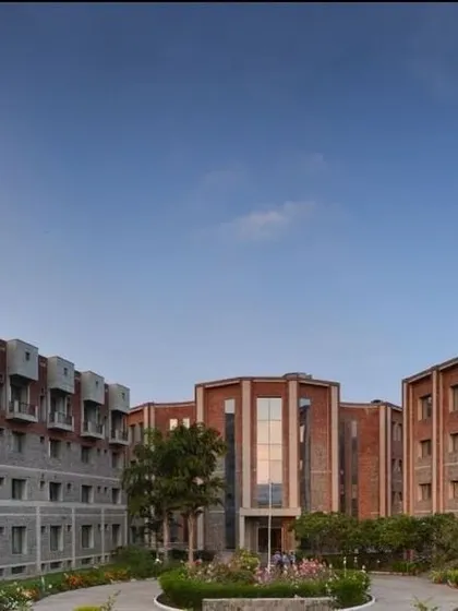 A daytime view of the ISID campus, showing how the different blocks create a cohesive and functional environment. Public architecture is about creating a sense of place. My design here uses natural materials and green spaces to build a campus that is both modern and grounded.