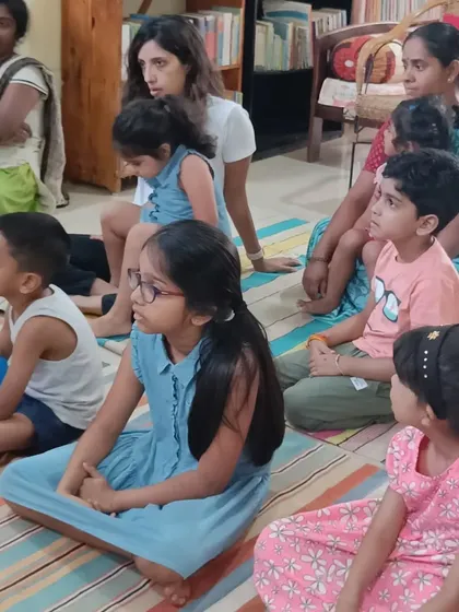 Another view of the mixed audience of parents and children enjoying the session.