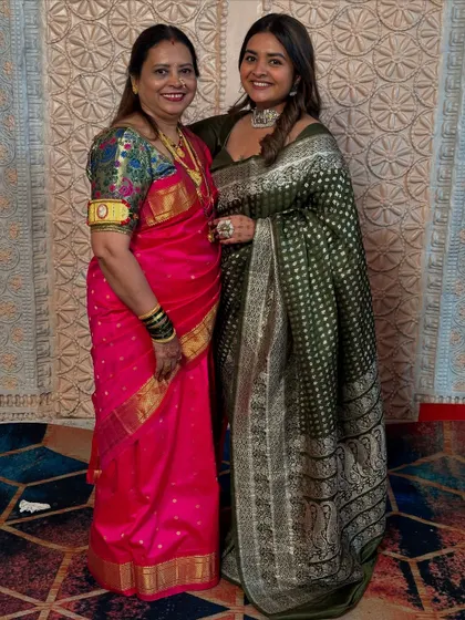 A tribute to my beautiful maa. Standing next to her in this photo, I am wearing her green wedding saree, while she is in a vibrant pink silk. Her grace and style are my biggest inspiration.