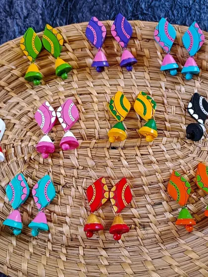 These images display the extensive variety of earrings I create, from jhumkas to studs and danglers, all showcasing different patterns, colors, and shapes ready for bulk orders.