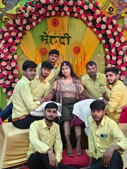 A beautiful bride surrounded by my team. We work like a family to make sure the bride's mehndi experience is perfect.