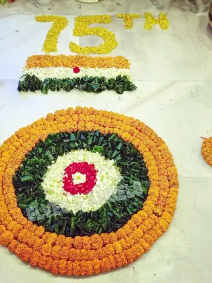 A patriotic floral rangoli I created for a Republic Day celebration, featuring the Indian flag's colors and the Ashoka Chakra made from marigolds and other flowers.