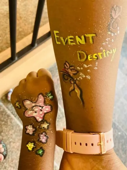 We offer professional and safe temporary tattoo and face painting services. Kids love choosing their favorite designs, like these glittery stars and flowers.