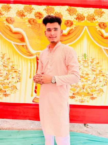 A full-length view of the light pink custom kurta. The classic cut and comfortable fit make it an easy choice for any festive occasion.