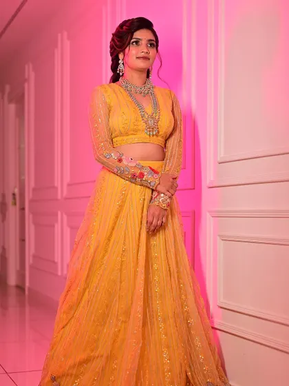 Posed for a traditional wear catalogue, this look required makeup that was both glamorous and commercial. The defined eyes and contoured features ensure the model looks striking in every shot.