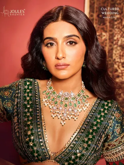 Made for the moment she says yes. This bridal look, featured in Cultured Wedding Magazine, showcases a stunning emerald and polki diamond necklace that exudes modern royalty.