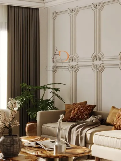 This angle showcases the detailed wall mouldings and heavy drapery that frame the living space, adding a touch of timeless elegance and privacy.