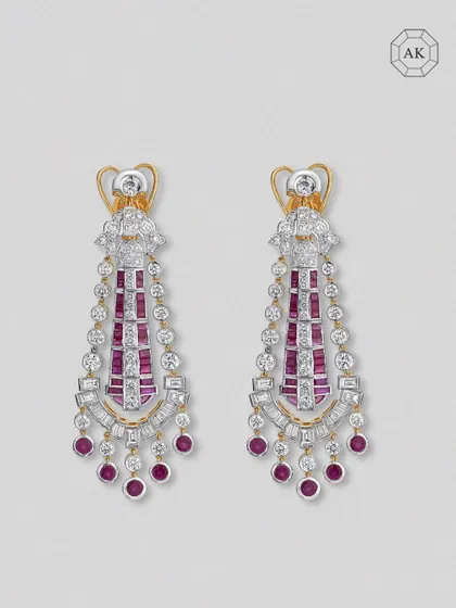 This pair from our Luxury Collection cascades rich African rubies from a mix of round and baguette-shaped diamonds, capturing strength wrapped in elegance.