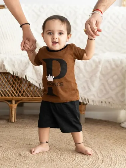 A baby's first steps are a huge milestone. We love to capture these moments, with parents holding their little one's hands as they learn to walk.