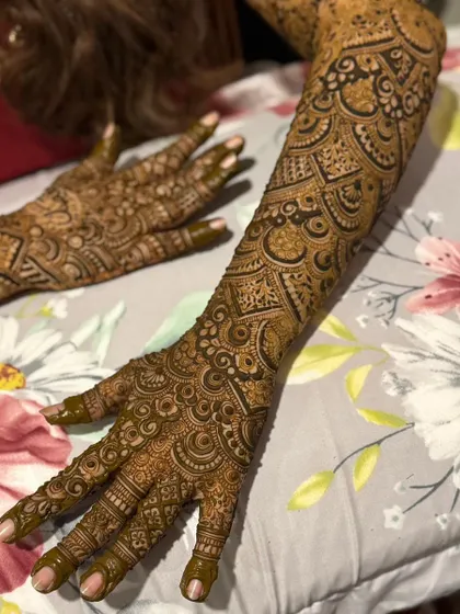 This is a detailed view of my intricate bridal henna work. Each design is unique, combining traditional patterns like paisleys and mandalas with fine-line fillers to create a stunning, full-coverage look for your special day.
